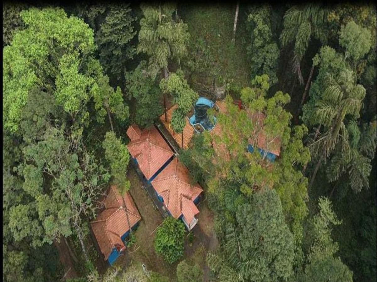 Отель Qexperiences Coorg Мадикери Экстерьер фото